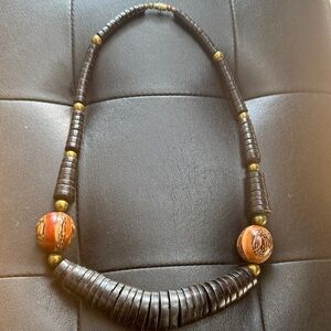 1970’s AFRICAN necklace featuring black heishi beads and large round beads.